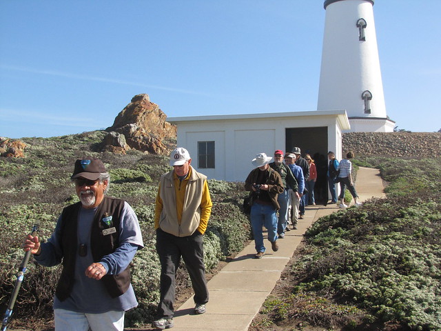 tour group and lighthouse